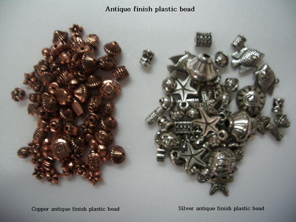 Metalized plastic bead