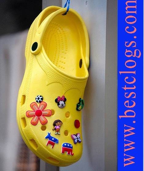 yellow crocs with pins