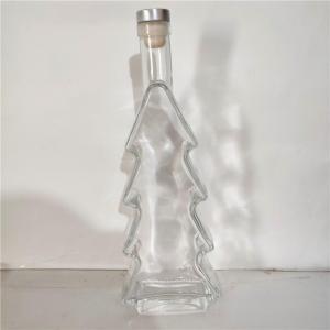 Wholesale custom perfume bottles: Wholesale Crystal White Glass Bottle Christmas Tree Wine Bottle 500ml Transparent Glass Bottle