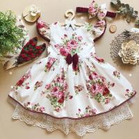 Vintage Dress for Baby of White Color Cloth with Flower Print...