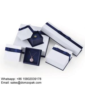 Wholesale stylish: Stylish White Jewelry Packaging Boxes with Blue Bottom and Ribbon Design