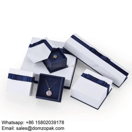 Stylish White Jewelry Packaging Boxes with Blue Bottom and Ribbon ...