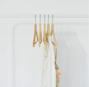 Wholesale garment hanger: 30% Off Wholesale Natural AB Grade Birch Wood Hanger with Anti-Slip Design