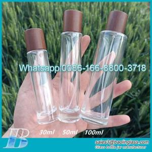 Wholesale wine box supplier: 30ml50ml100ml Bayonet Long Cylindrical Perfume Glass Bottle Wooden Cap