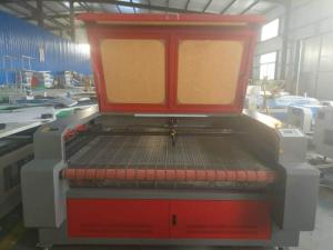 Wholesale w: HQ1610A CO2 Laser Cutting Machine/Laser Cutter W/Auto Roll Feeer for Fabrics 1600*1000mm