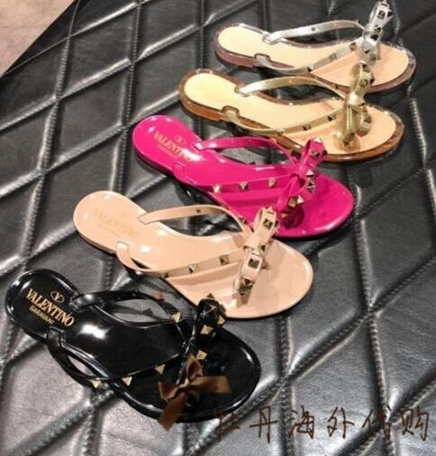 studded bow jelly sandals