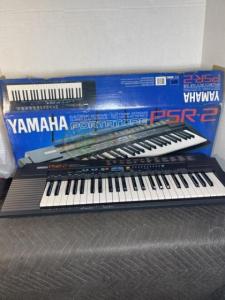 Wholesale 49: YAMAHA-- PSR-2 Portatone 49-Key Portable Electronic Keyboard... +1 (689) 225-9139